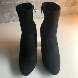 Black suede booties with acrylic heel